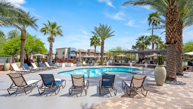 Embrace the Arizona sun on our spacious sundeck, complete with inviting loungers. - Level 550