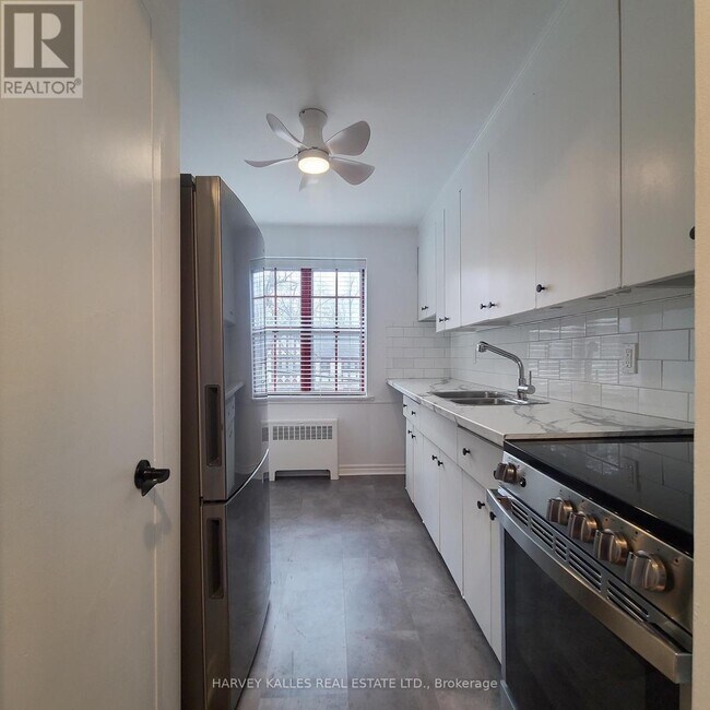 Photo du bâtiment - 65 Old Mill Rd