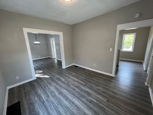 Building Photo - Updated 4-Bedroom Home with Plenty of Living and Storage Space.