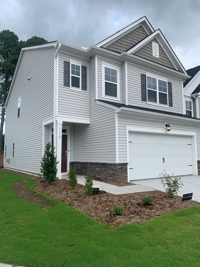 Photo - BRAND NEW TOWNHOME! 2 CAR GARAGE. SCREENED IN PORCH. MODERN KITCHEN. OPEN CONCEPT LIVING. BONUS ROOM