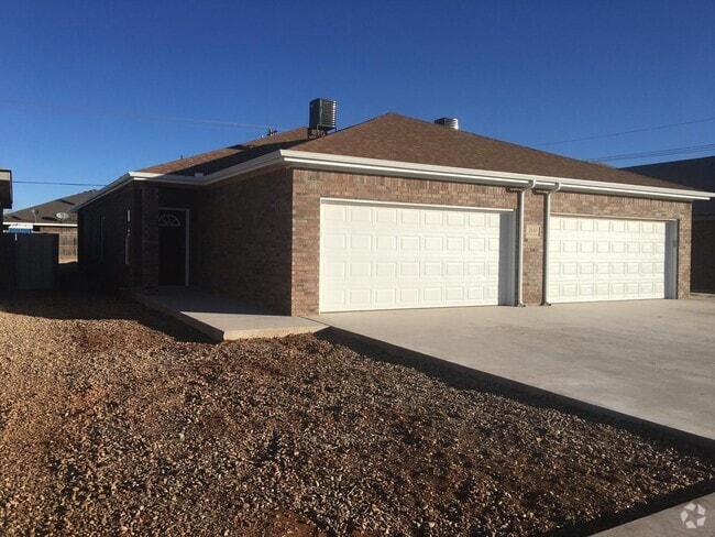 Sets back from the main road. - 2640 E 14th St
