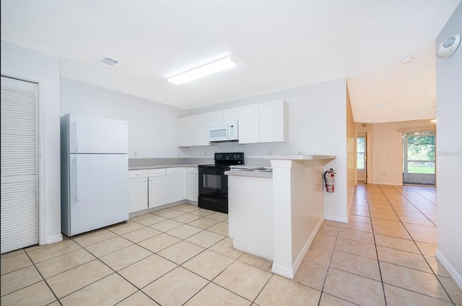 Building Photo - 8831 Grand Palms Cir