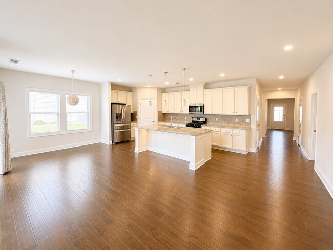 Photo - Better Than New | Ranch Home with Flex Room, 3-Head Spa Shower, Covered Outdoor Living & Premium ...