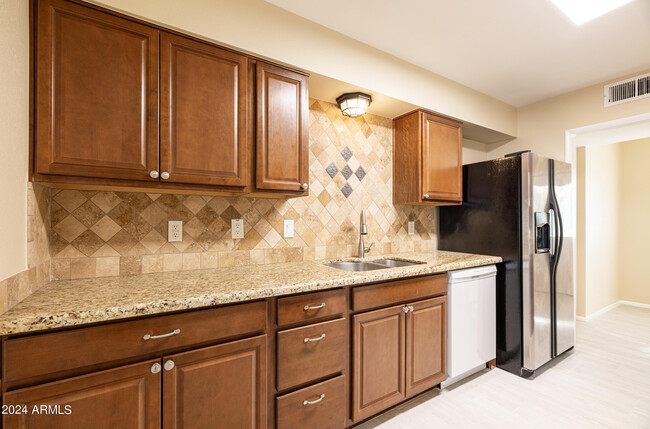 Building Photo - 12208 N Pebble Beach Dr