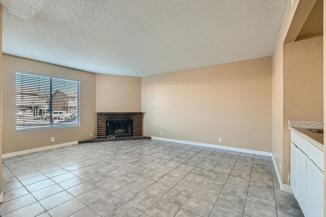 Building Photo - 1st Floor 2 Bedroom Unit with Brick Firepl...