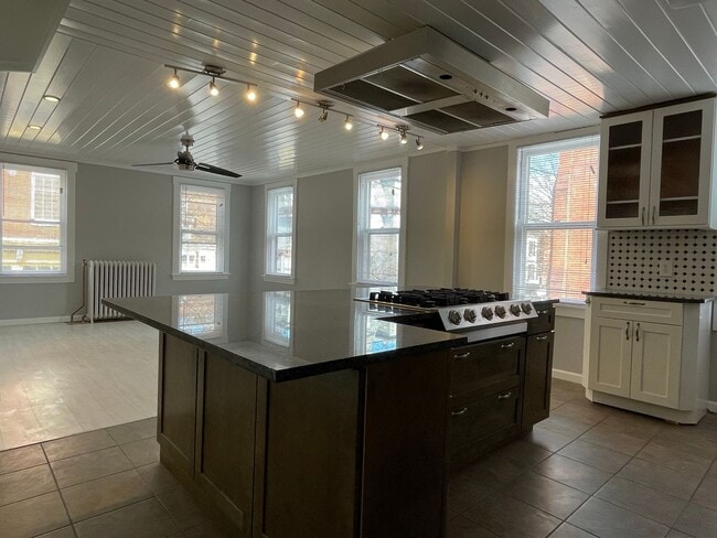 Building Photo - Small pets are welcome with an additional ...