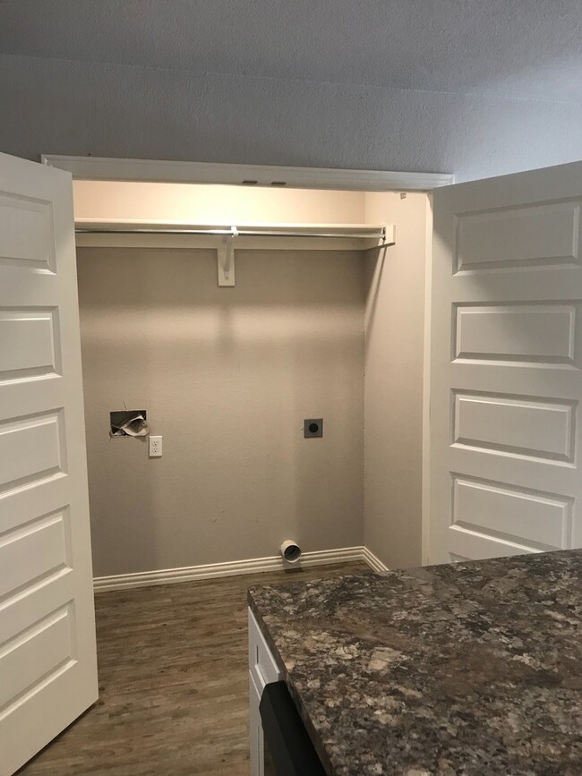 Building Photo - BH-OZIER TRIPLEX