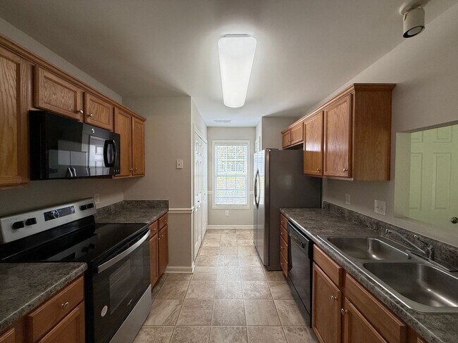 Foto del edificio - 5813 Huckleberry Ct