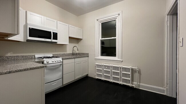 BRAND NEW kitchen! - 7827 Montgomery Ave