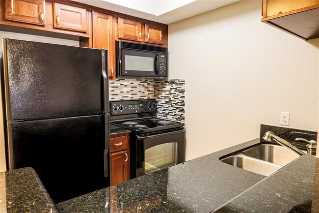 Foto del edificio - 4515 Briar Hollow Pl