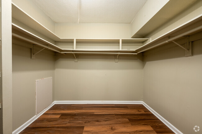 2BR, 1BA - 748SF - Primary Bedroom Closet - The Crossings