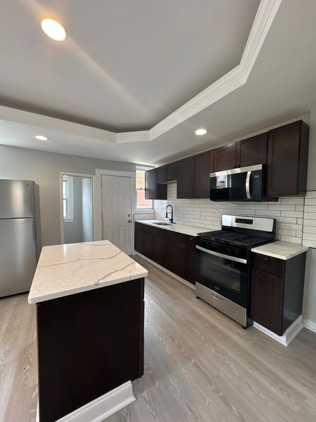 Building Photo - 3 Bedroom, 21206