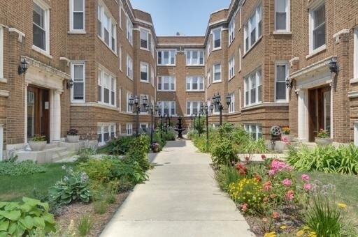 Building Photo - 6910 N Lakewood Ave