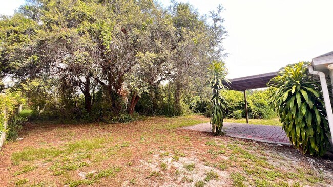Foto del edificio - Spacious 4-Bedroom Home in Prime Orlando L...