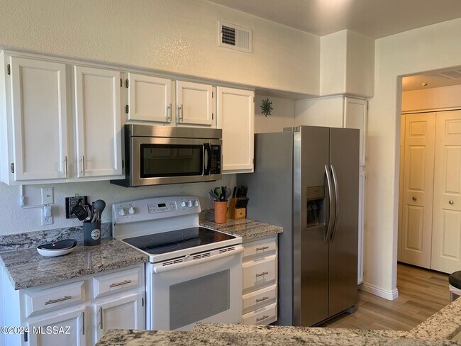 Building Photo - 7050 E Sunrise Dr