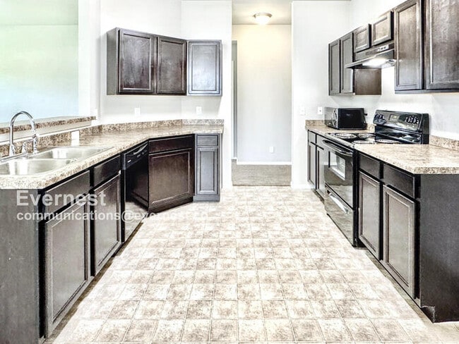 Foto del edificio - 6614 N 128th E Ave