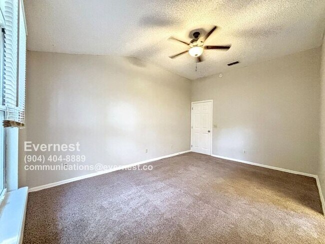 Building Photo - Lovely 4-Bedroom Home with Fireplace and F...
