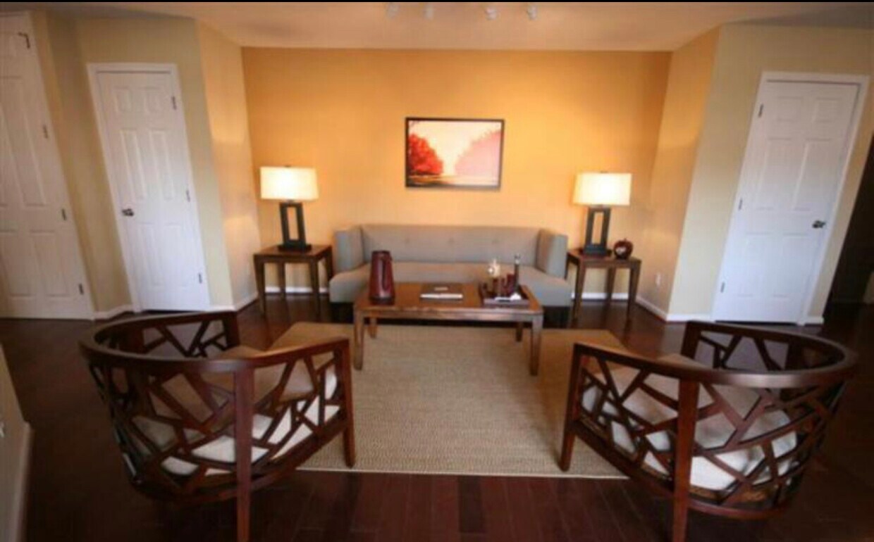 Living room area with furniture - 1386 Bryant St NE