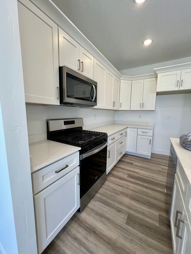 Building Photo - BONUS FOR QUICK MOVE-IN BRAND NEW TOWNHOME