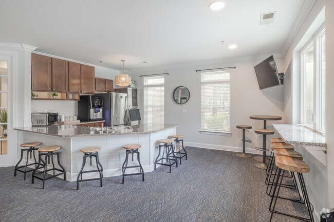 Cocina de la casa club - Channel Family Apartment Homes