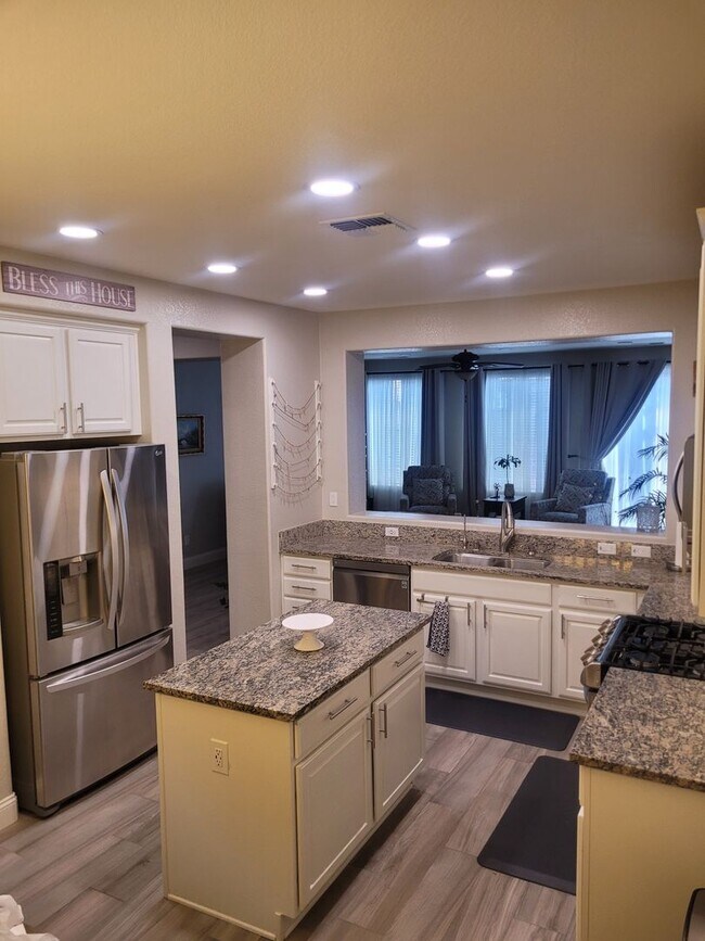 Building Photo - BEAUTIFUL - UPGRADED - LAMINATE FLOORING -...
