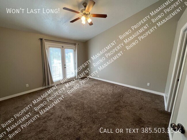 Building Photo - REDUCED RENT!! 3 Bd/3 Ba Townhome in Spani...