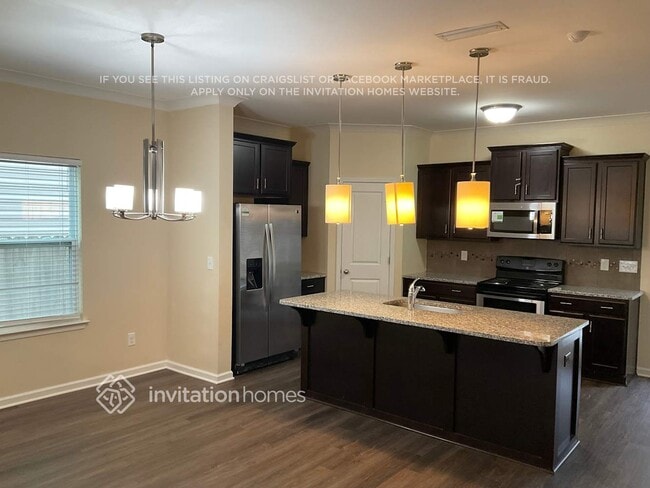 Foto del edificio - 8130 Dumphries Dr