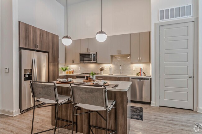 2BR, 2BA - 1057 SF B1 - Kitchen - Isaac Apartments