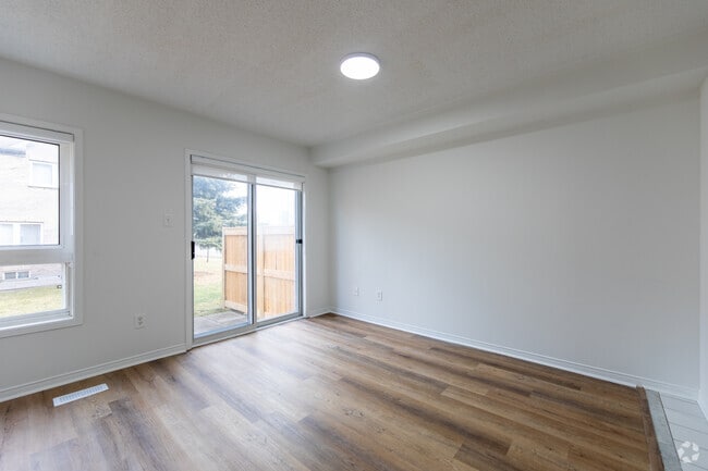 3BR, 3BA - 1,393SF - Living Room - Erin Centre Village