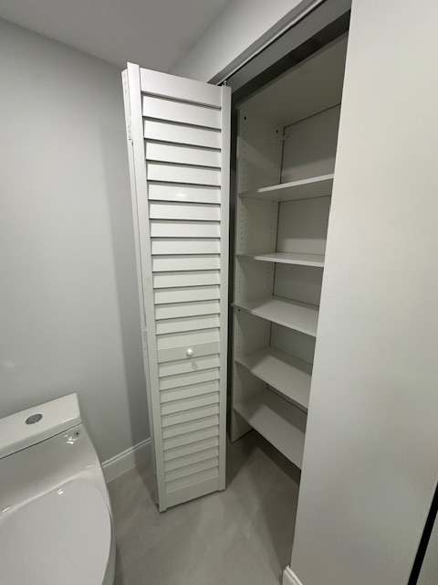 primary bath storage - 11910 SW 13th Ct