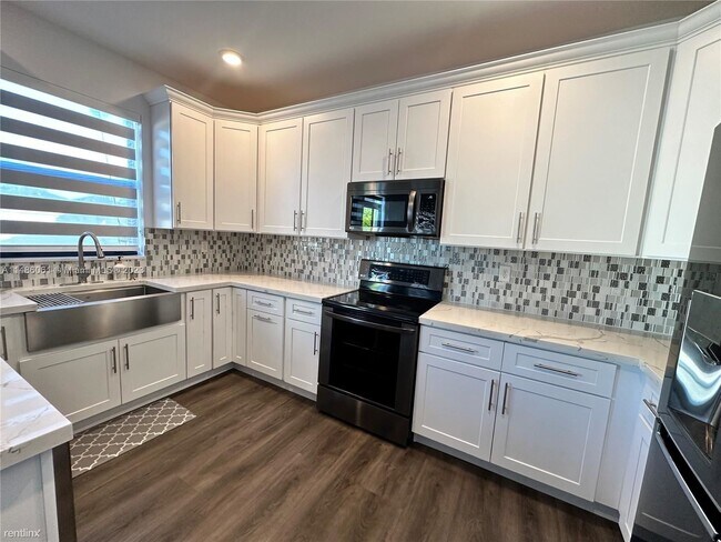 Foto del edificio - 5 br, 3 bath House - 3577 W 94th Ter