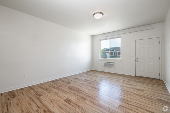 2BR, 2BA - 984SF - Living Room - Chubbuck Whitaker