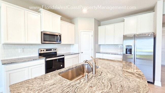 Building Photo - OUTSTANDING NEW BUILD 4 BEDROOM/3 BATH CAR...