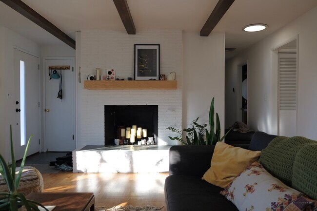 Living room w/ decorative fireplace / mantel - 8818 22nd Ave SW
