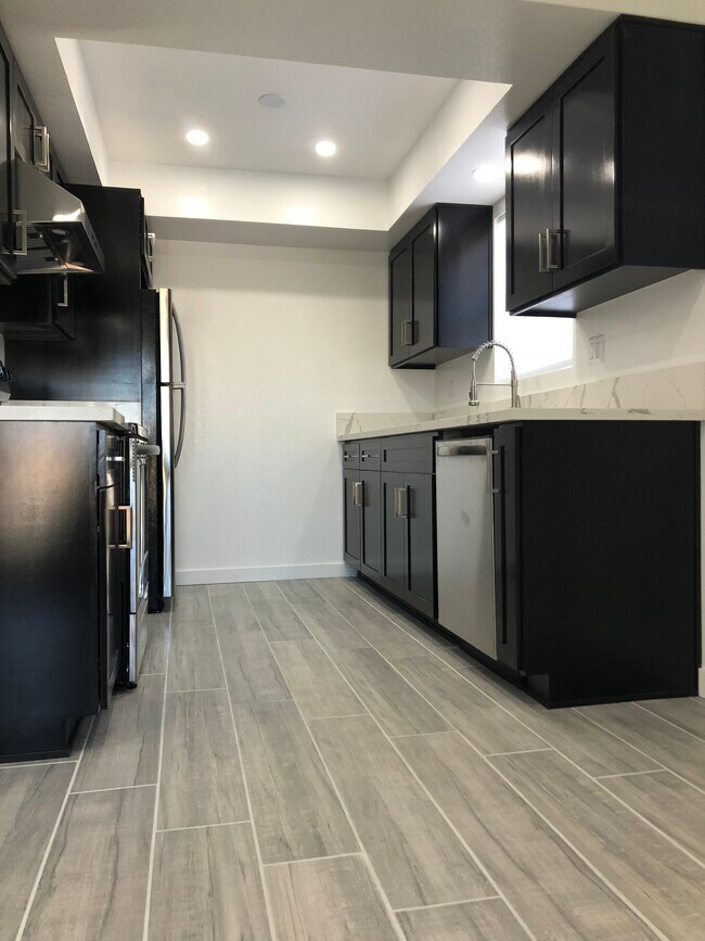 kitchen with all new appliances - 1110 Leland Way
