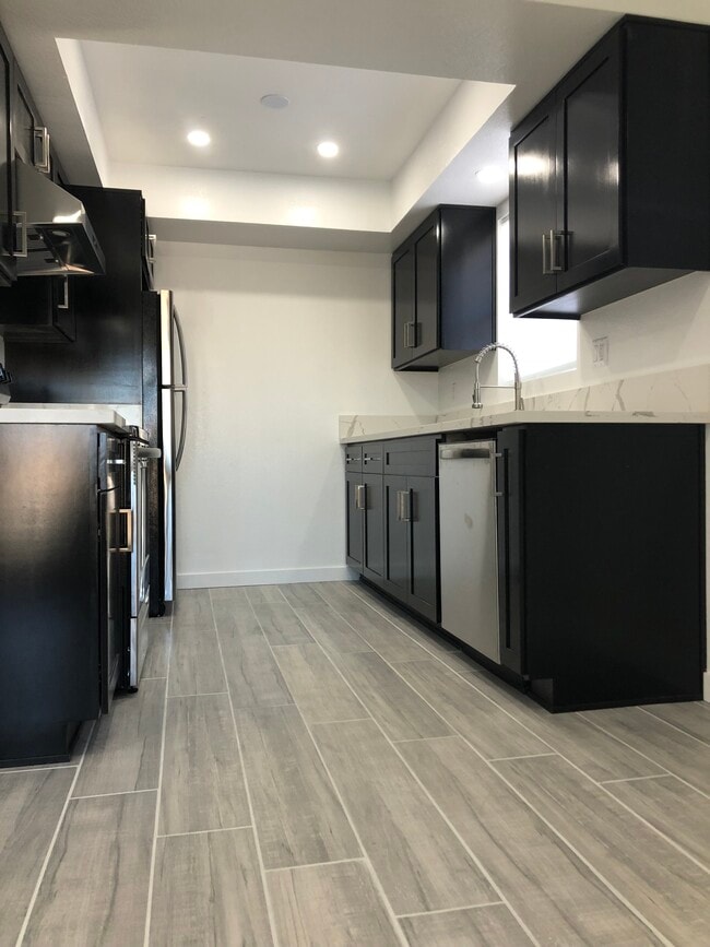 kitchen with all new appliances - 1110 Leland Way
