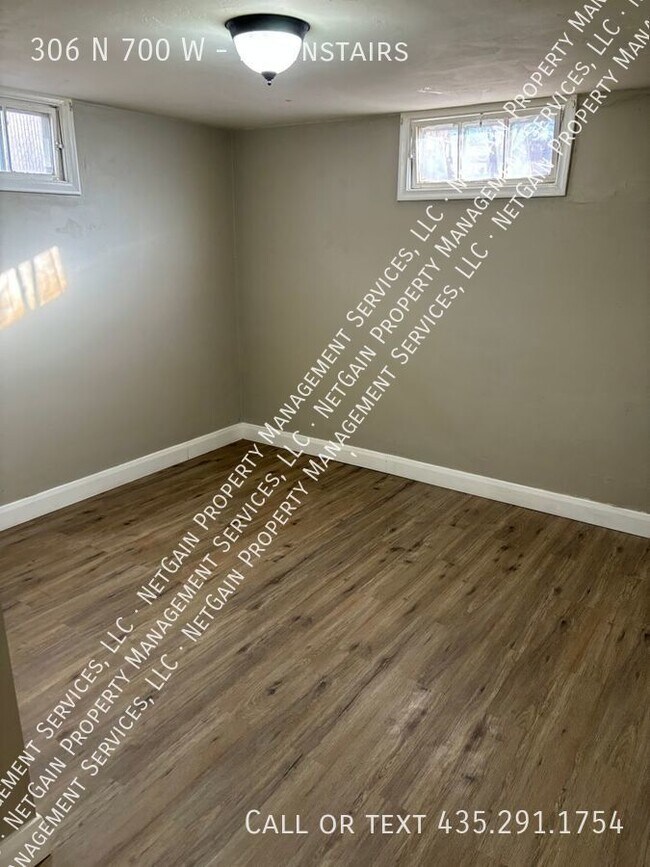 Building Photo - Pet Friendly 2 Bedroom Basement Apartment