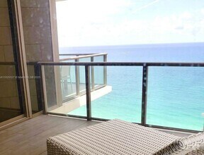 Building Photo - 9705 Collins Ave