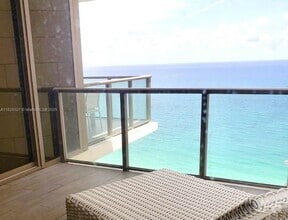 Building Photo - 9705 Collins Ave