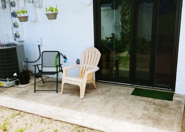 Sliding glass doors open to private patio - 703 S Daytona Ave