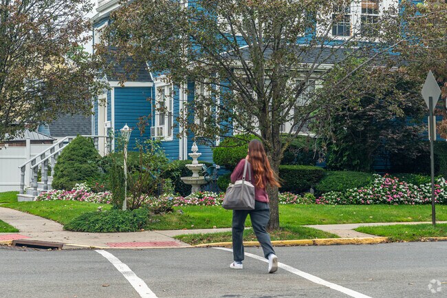 Students and residents get to work or school by walking through the quiet streets of Fairview.