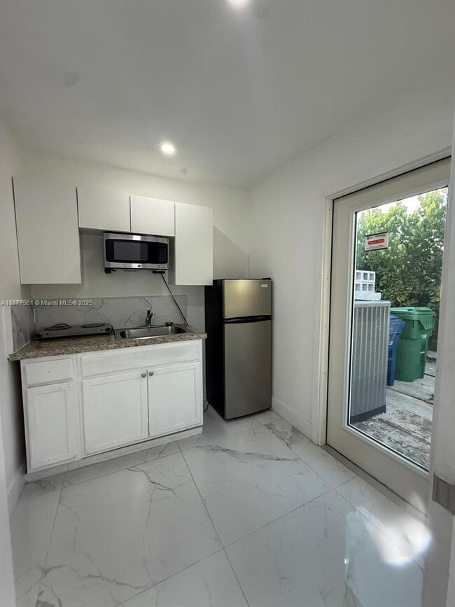 Building Photo - 2410 SW 143rd Ct