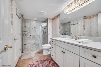 Building Photo - 5950 Pelican Bay Blvd