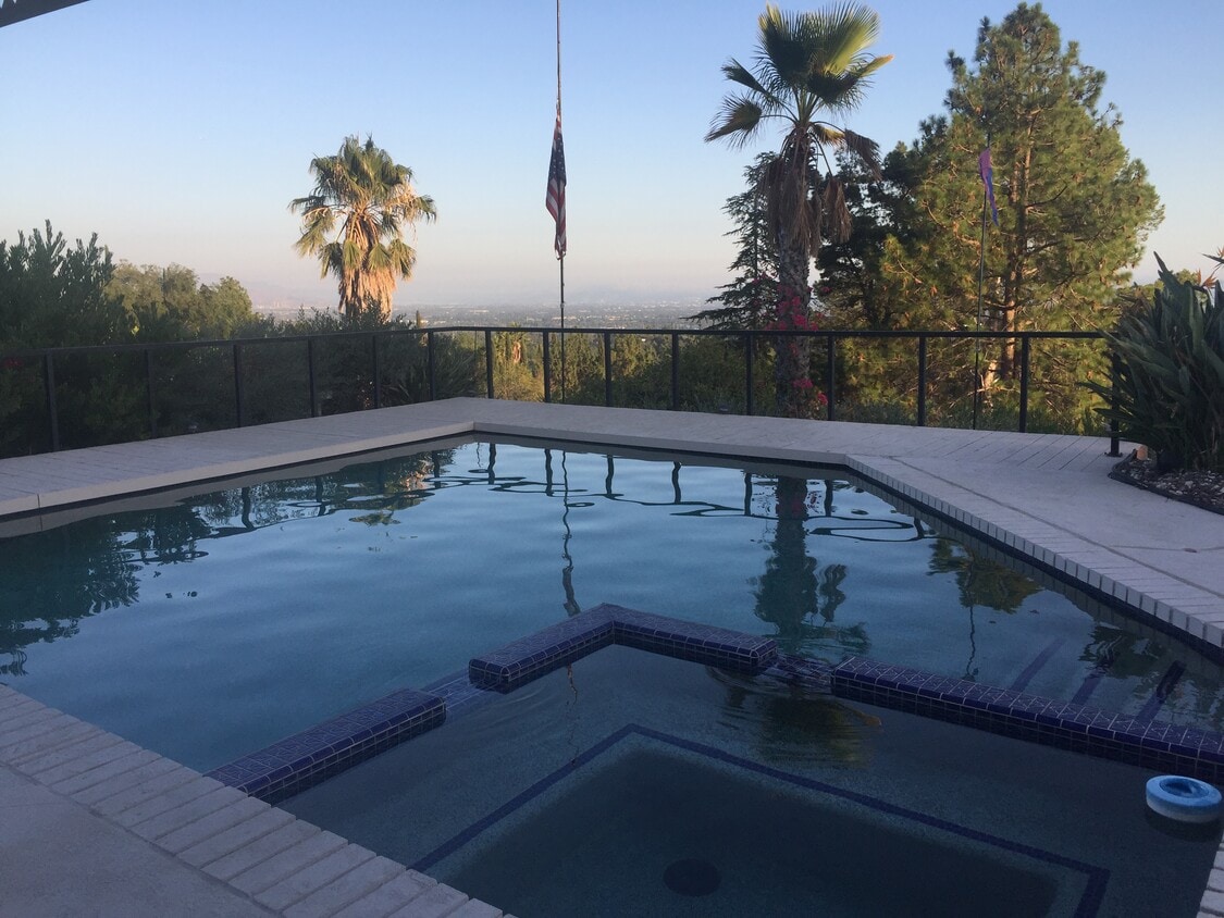 Pool/Jacuzzi with views of city - 12644 Nola Pl