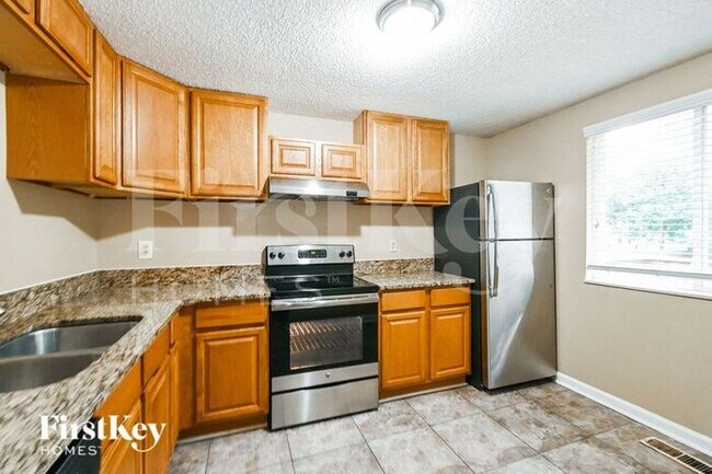 Foto del edificio - 6811 Abelia Hill Cove