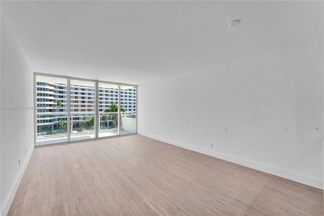 Building Photo - 5600 Collins Ave