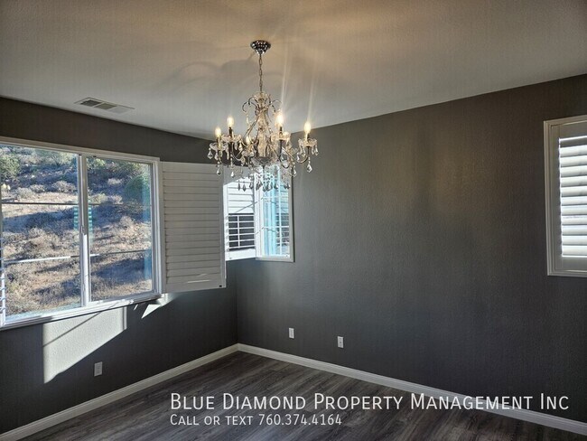 Building Photo - Spacious 3 BR, 2.5 BA in gated community o...