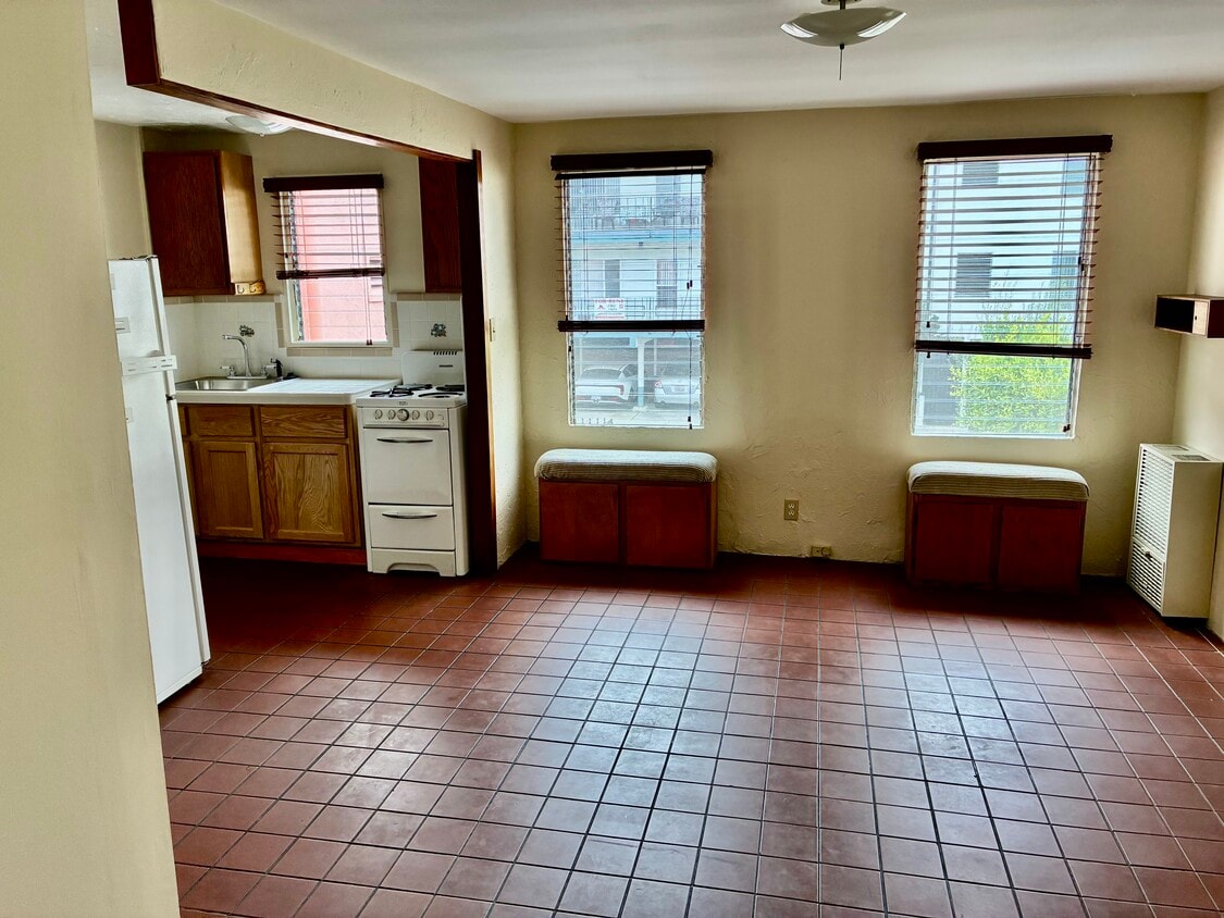 Living area with kitchen looking North - 1001 N Sierra Bonita Ave