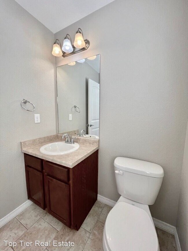 Building Photo - 4 br, 3.5 bath House - 6565 Alliance Loop