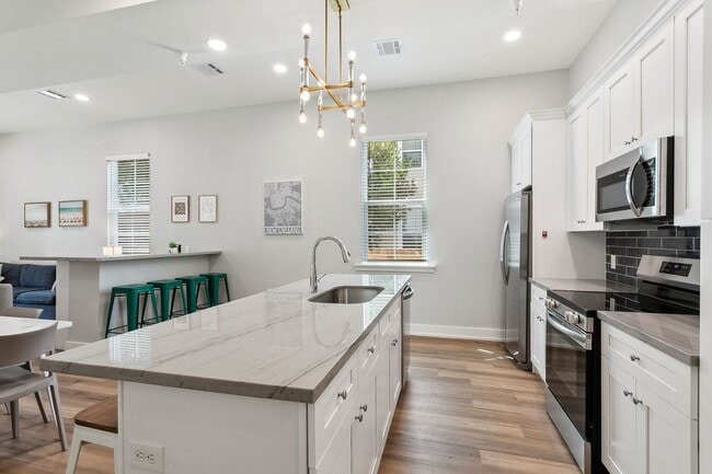 Photo - 4 Bed 3 Bath unit featuring a wet bar!! Apartment